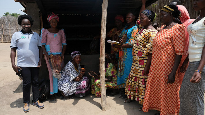 Womens Loan and savings group Terekeka in front of fish drying oven