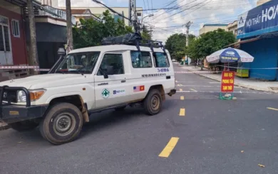 An NPA vehicle entering an area under lockdown where high risk groups are living