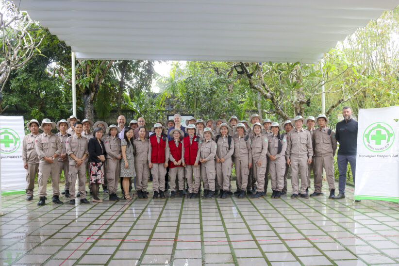 Group photo between the delegation and NPA Hue staff